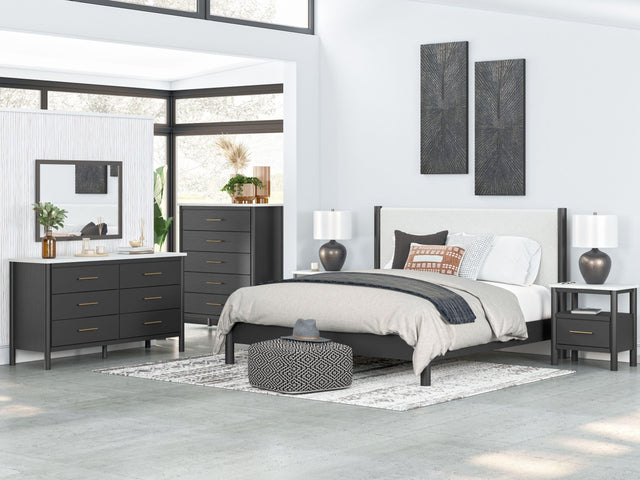 Ashley Cadmori - Black / White - 8 Pc. - Dresser, Mirror, Chest, King Upholstered Panel Bed, 2 Nightstands