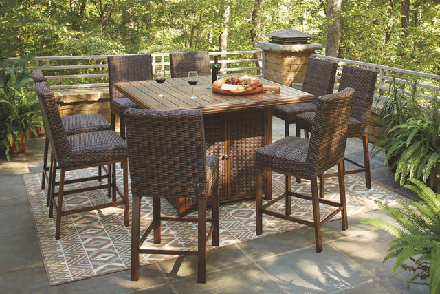 Ashley Paradise Trail - Medium Brown - 9 Pc. - Fire Pit Table, 8 Barstools